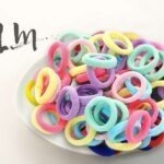 BABY HAIR BANDS BOTTLE 100 PCS